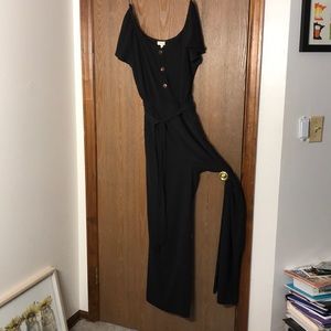 Black jumpsuit with buttons and tie belt
